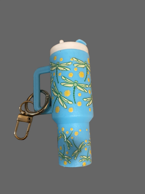 A blue dragon fly tumbler key chain it hold loose change or chapstick 